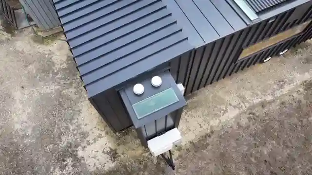 genius-crafts-stunning-tiny-house-seamless-trailer-joining-automated-systems